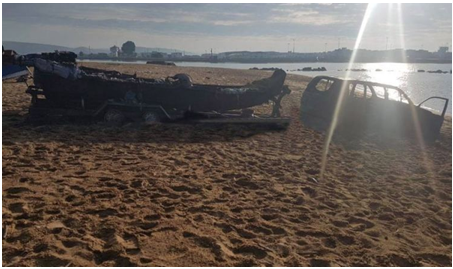 مطاردة هوليودية تنتهي بإحراق مهربون لسيارة وزودياك على الشاطئ (صور)